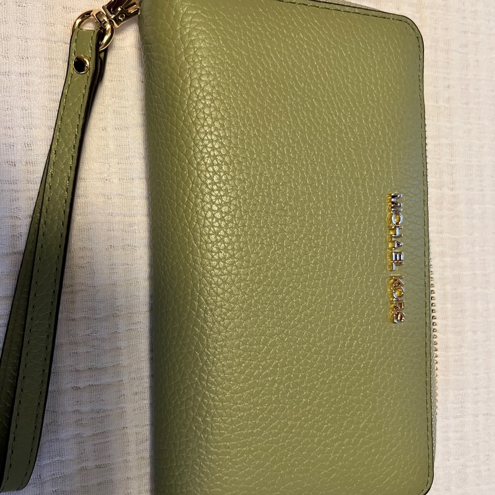 Michael Kors Jet Set Travel Pebbled Leather wristlet Wallet in color light sage